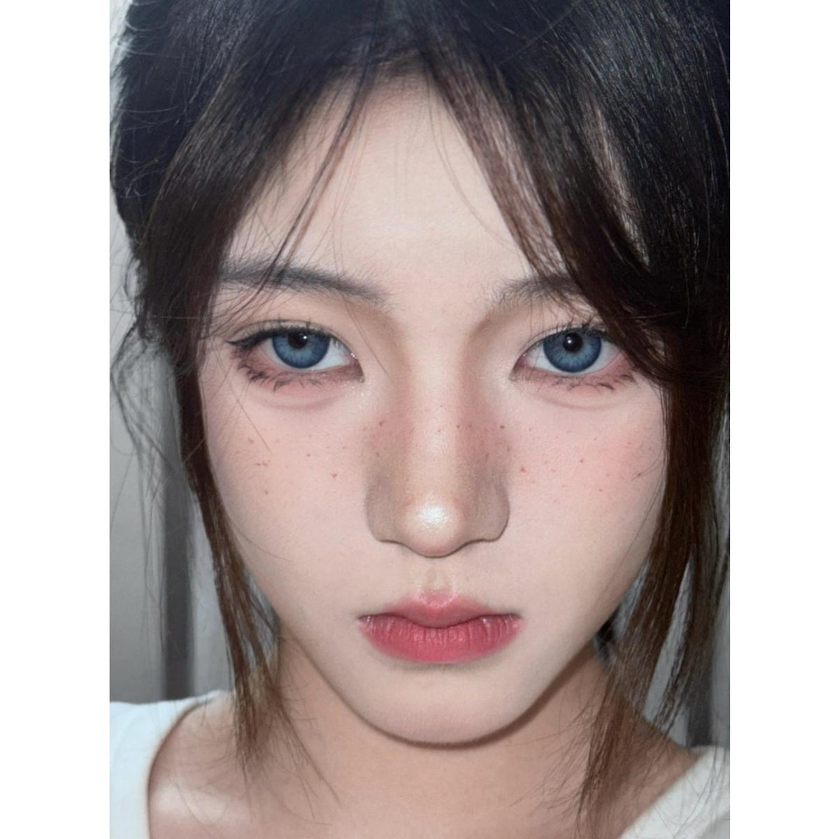 คอนแทคเลนส์สี DZXBLAN Xiyoulens ขนาด 14.20 มม. สีน้ำเงิน (ชนิดราย 6 เดือน)