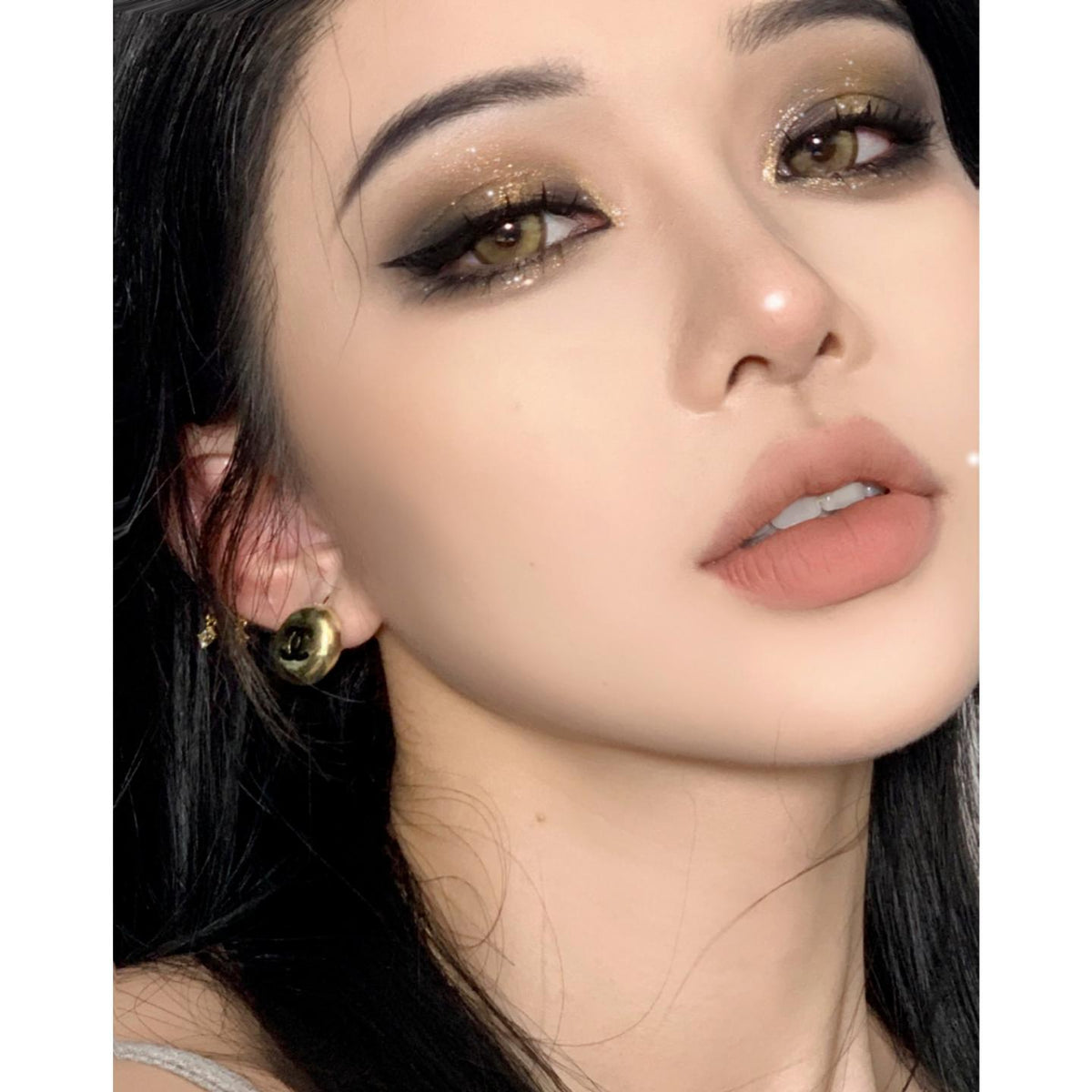 คอนแทคเลนส์สี DJKUAI Xiyoulens ขนาด 14.20 มม. สีน้ำตาล (ชนิดราย 6 เดือน)